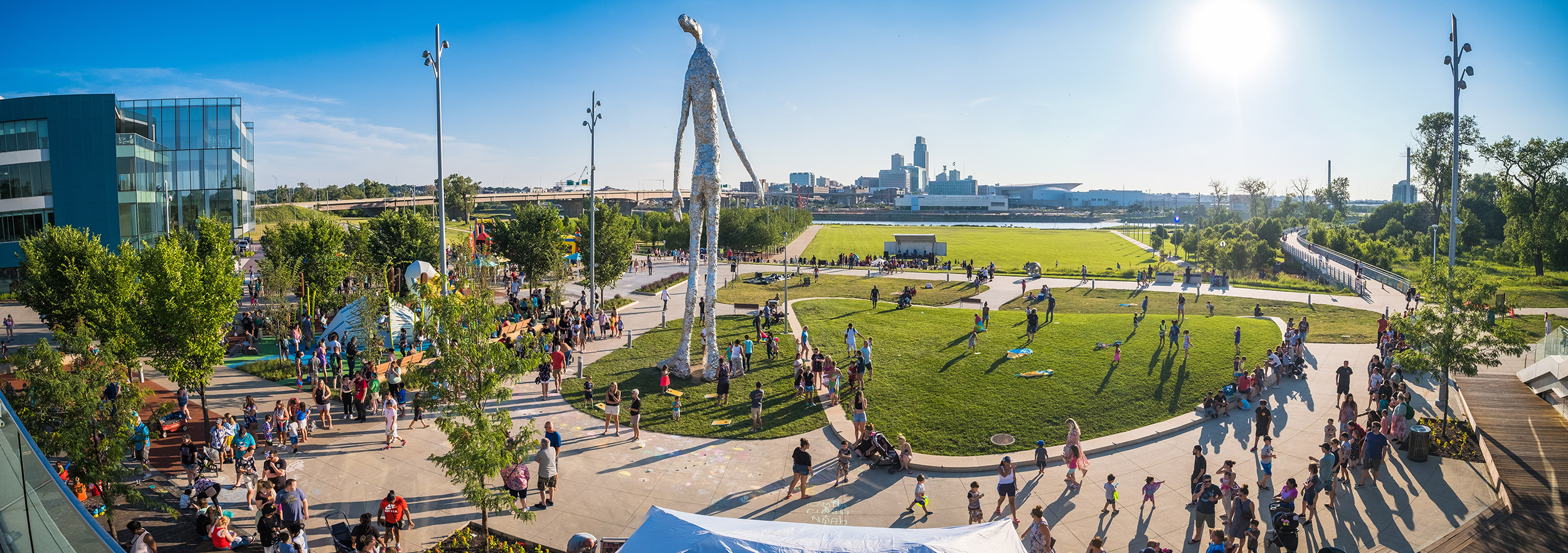 Bird's eye view of crowd of people and large sculptures at River's Edge park in Council Bluffs, Iowa