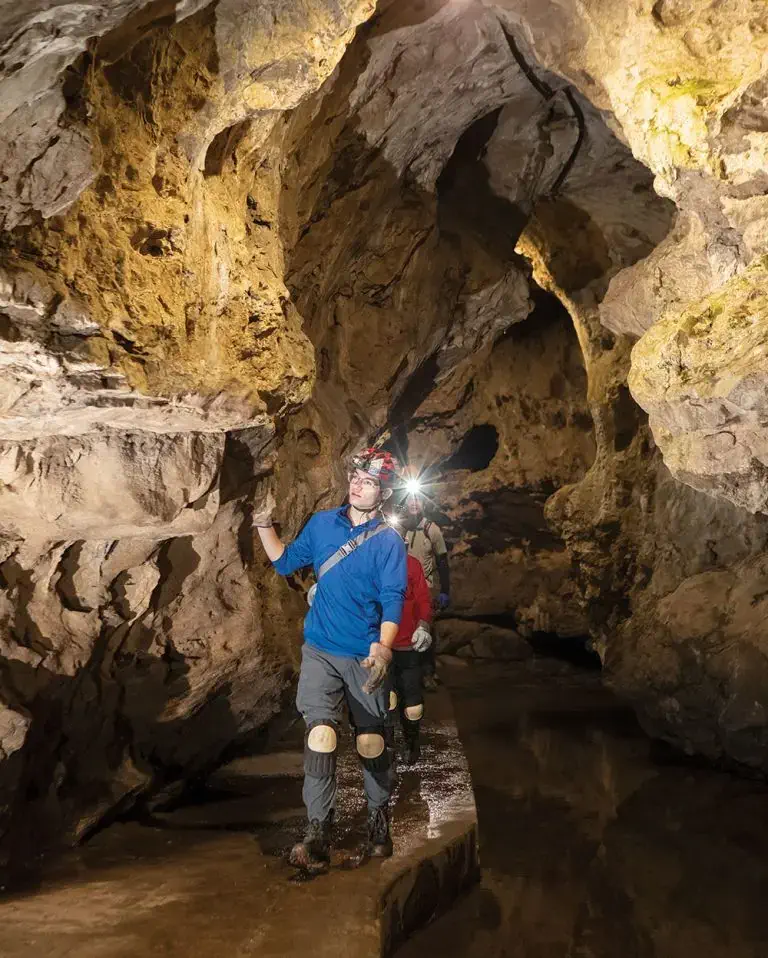 People exploring caves.