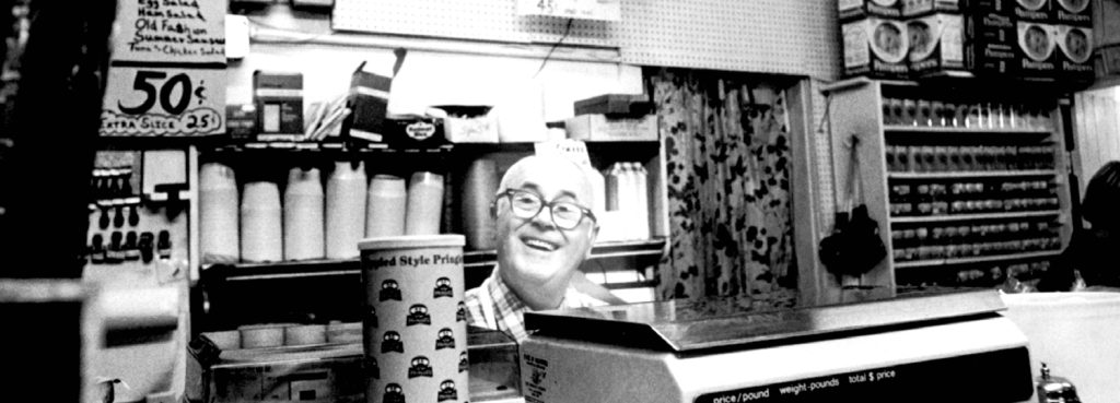 John Alberhasky 1978 behind deli counter