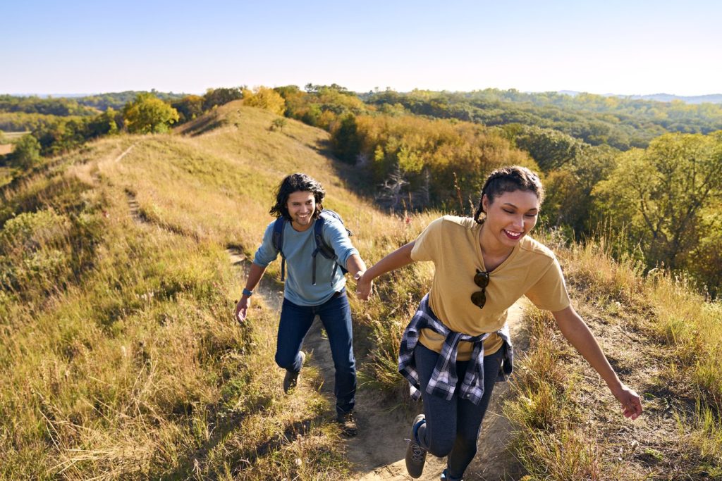 Man and woman hiking in Loess Hills