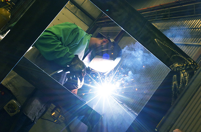 person welding