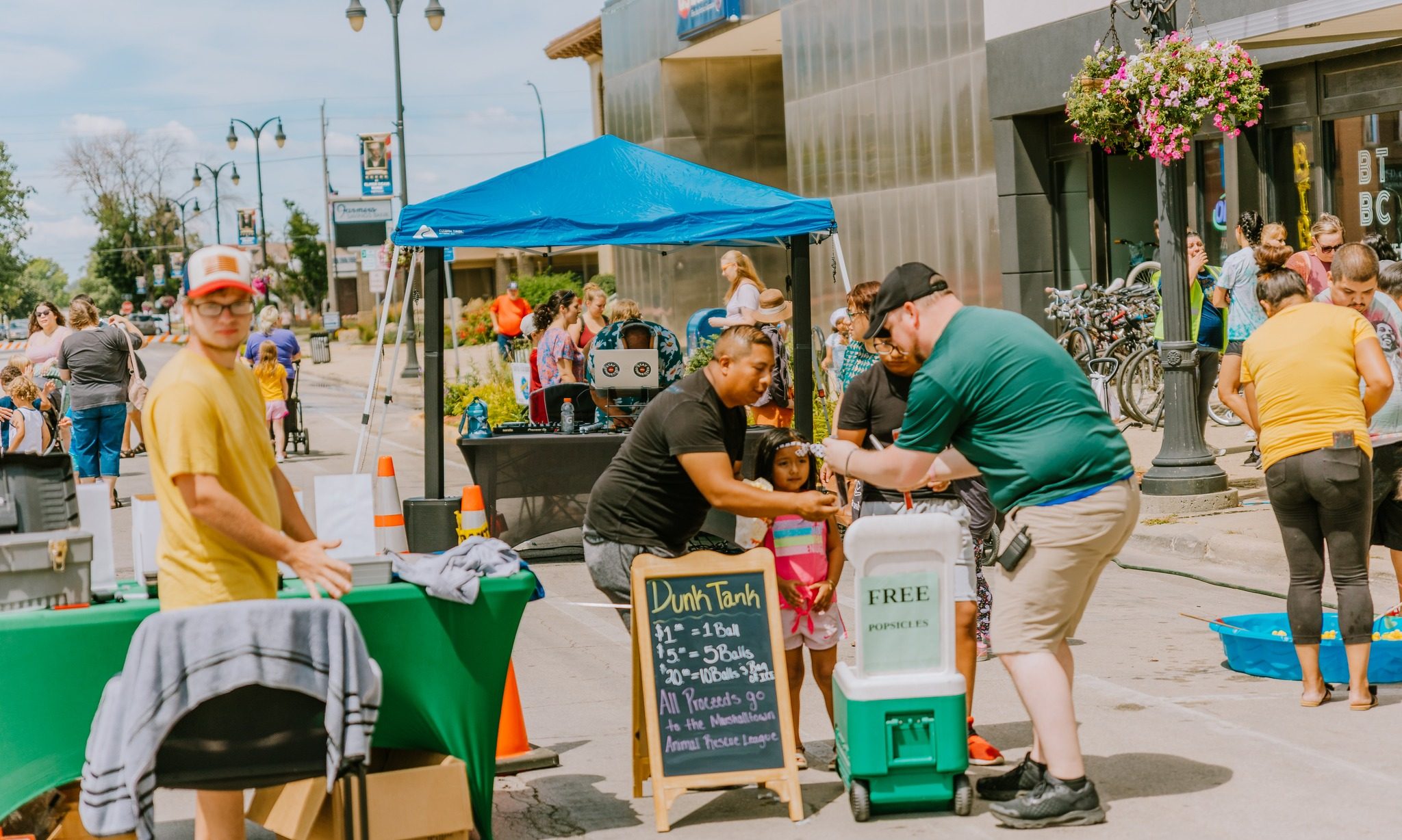 Crowd of people at a street festival in Marshalltown