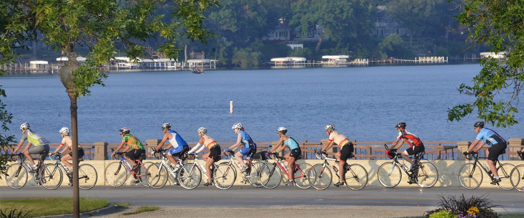 bicyclists along lake