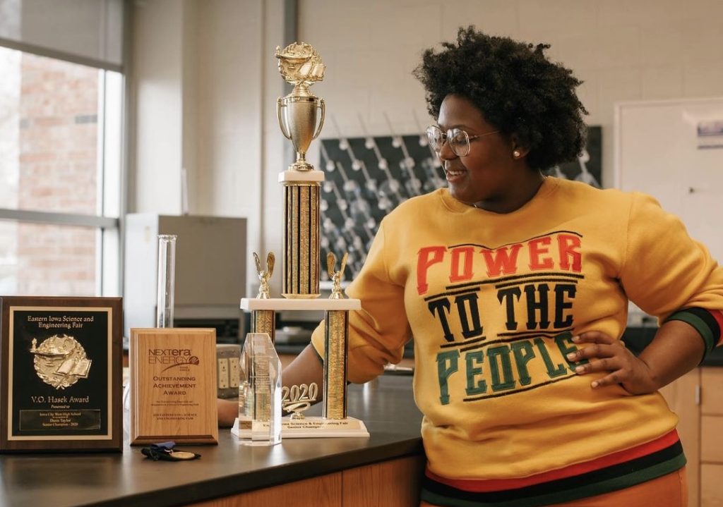 Woman admiring trophy