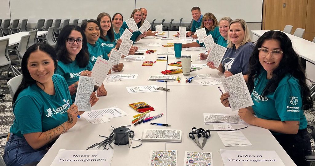 employees at conference room table