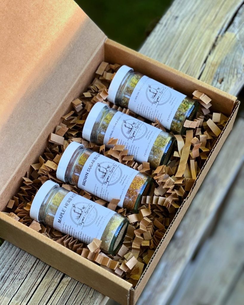 four jars of spices in gift box