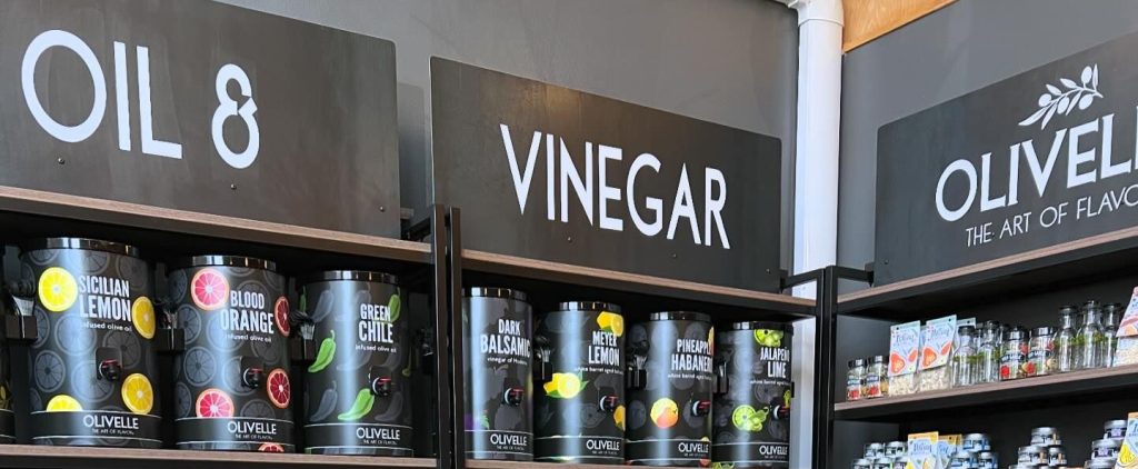 store display shelves containing oils and vinegars